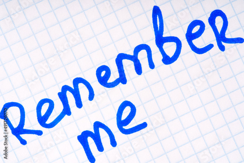 Written with a marker remember me . Closeup