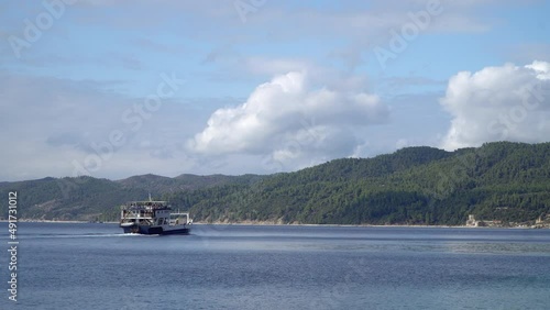 Ferry boat at Mount Athos near Zographou H. Monastery small harbour photo