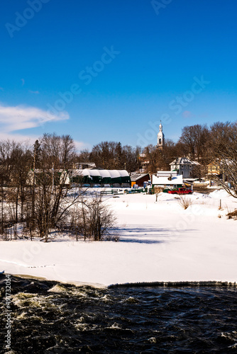 Looking upstream from the five stone arch bridge over the Mississippi River in the village Packenham seen here in March.