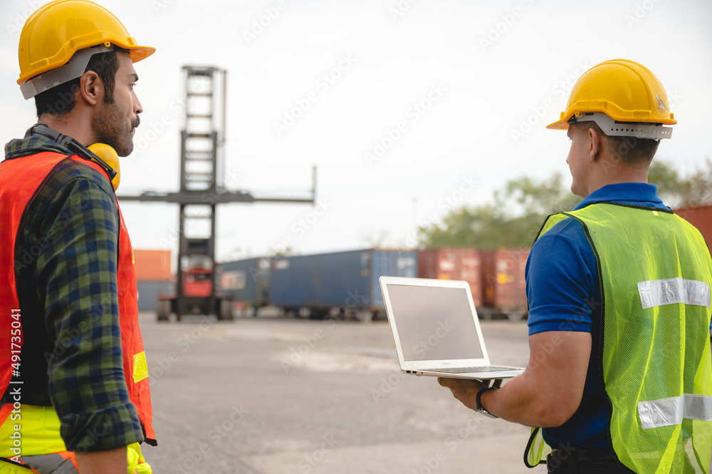 foreman worker or engineer are working about logistic industrial transport shipping container foreman worker or engineer are working about logistic industrial transport shipping container