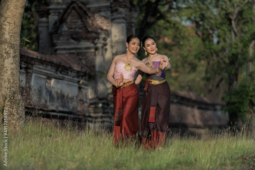 portrait of couple. Beauty fantasy Thai women. Beautiful Thai girl in traditional dress custume , Ayutthaya province, Thailand. Asian women wearing traditional Thai culture, vintage style, Thai
