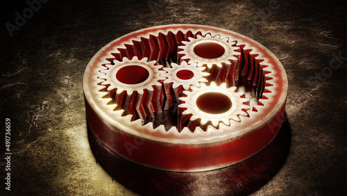 planetary gear mechanism - red painted metallic double helical gears with worn edges on a scratched metallic surface