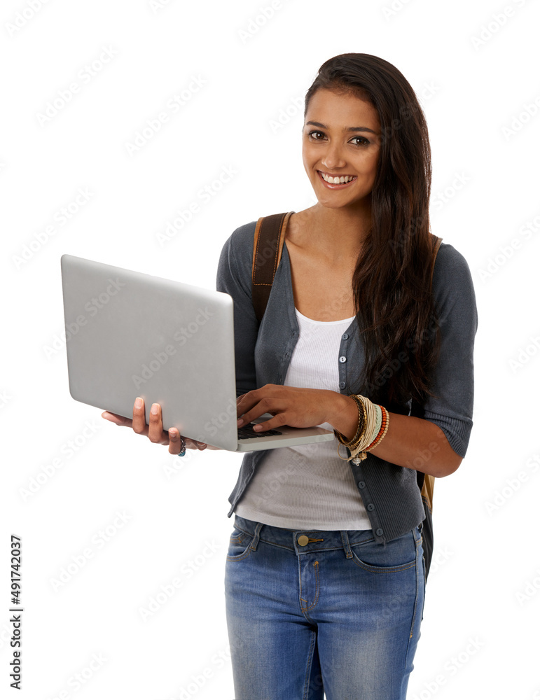 Ready for the lecture hall. A college student with a backpack and a laptop smiling at the camera. Ready for the lecture hall. A college student with a backpack and a laptop smiling at the camera.