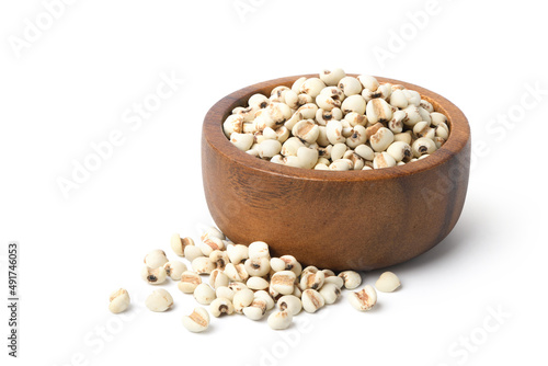 Job's tears ( Adlay millet) in wooden bowl  isolated on white background.