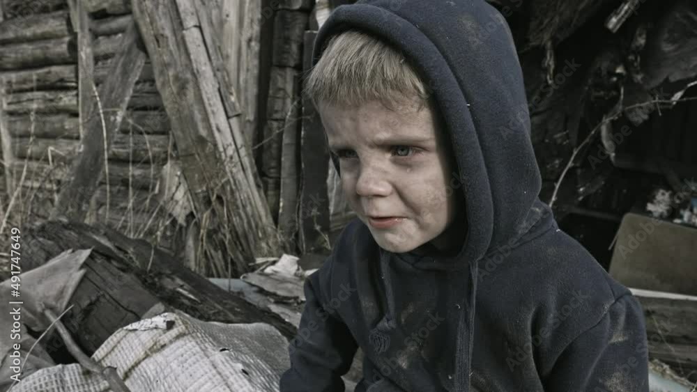 A child is crying^ playing in the ruins A child is crying^ playing in the ruins