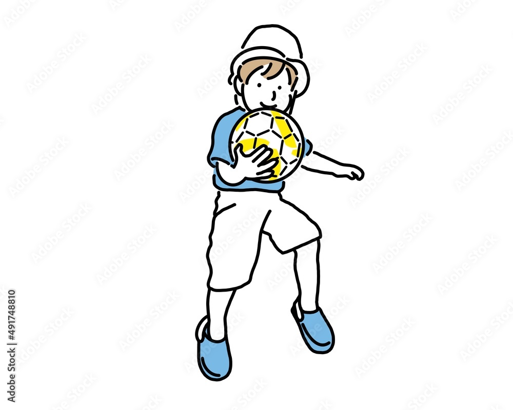 Fototapeta premium サッカーボールを大事に抱える男の子