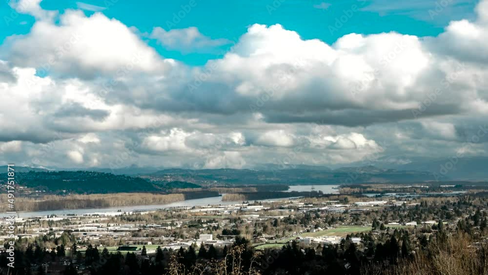 Big fluffy clouds rolling over Troutdale, Oregon. Big fluffy clouds rolling over Troutdale, Oregon.