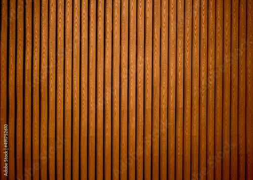 texture of brown perpendicular slat wall.