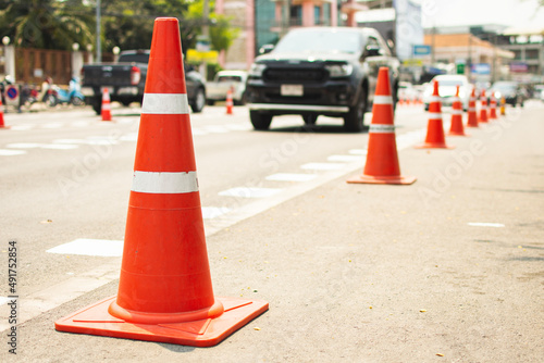 Traffic cones are placed on the road.