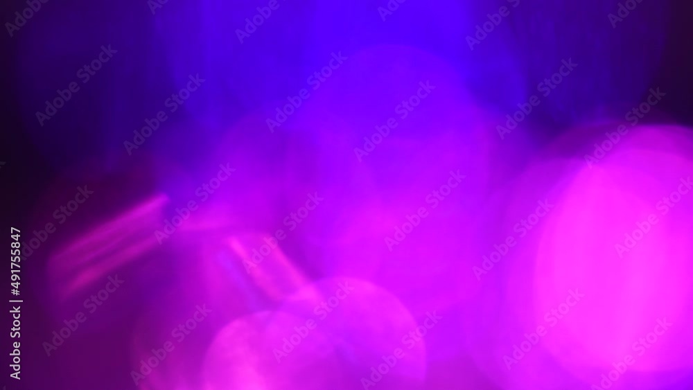 Retro neon purple dark blue hot pink colors. Blur in motion. Optical Crystal Prism Flare Beams. Abstract light animation. Neon light flares background or overlay Retro neon purple dark blue hot pink colors. Blur in motion. Optical Crystal Prism Flare Beams. Abstract light animation. Neon light flares background or overlay