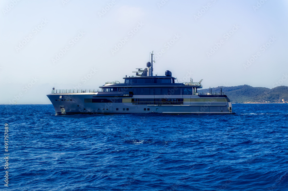 Luxury yacht anchored at bay of island of Ibiza, Spain.