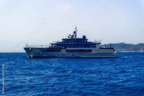 Luxury yacht anchored at bay of island of Ibiza, Spain. © Goran