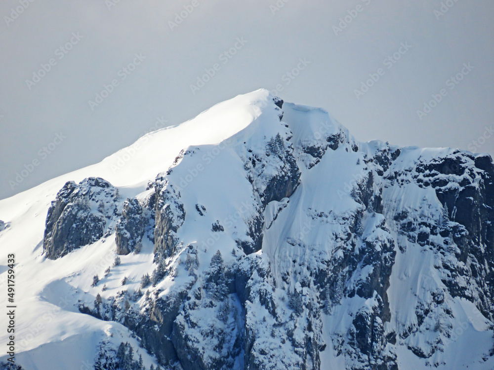 Snow-capped alpine peak Lütispitz (Luetispitz or Lutispitz, 1986 m) in Alpstein mountain range and in Appenzell Alps massif, Unterwasser - Canton of St. Gallen, Switzerland (Schweiz)