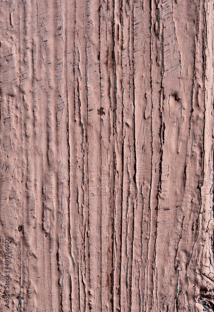 Close-up of a wooden board painted with beige paint as an abstract textural background. A board with peeling, scratched and sun-bleached brown paint. Texture of old painted boards Close-up of a wooden board painted with beige paint as an abstract textural background. A board with peeling, scratched and sun-bleached brown paint. Texture of old painted boards