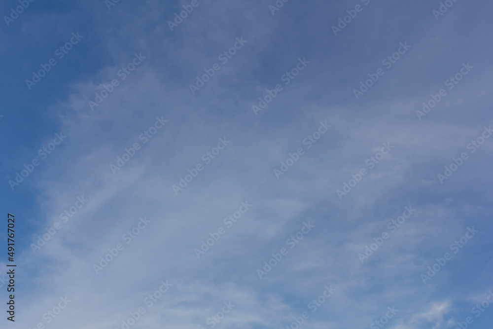 white fluffy clouds in the blue sky, nature background white fluffy clouds in the blue sky, nature background