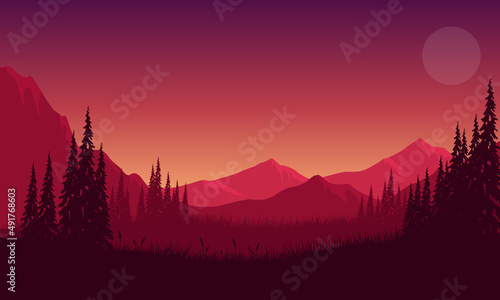 Panoramic silhouette of mountains with beautiful pine tree branches from the edge of the village
