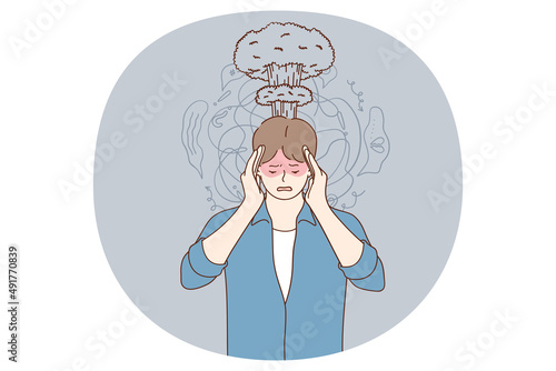 Feeling pain and headache concept. Young man standing touching head feeling pain like volcano burning inside of his brain vector illustration 