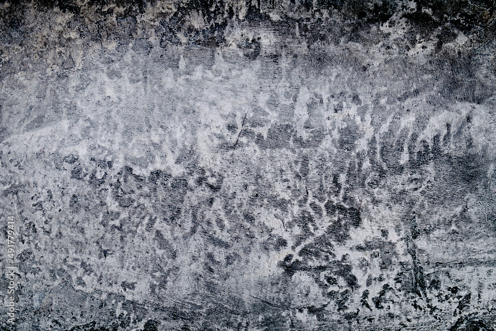 Fototapeta premium Outdoor concrete texture, beautiful antique pattern on a concrete wall in white gray and dark colors concrete texture