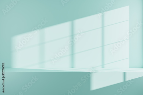 Abstract blue wall with sunlight and window shadows and mock up place. Gallery concept. 3D Rendering.