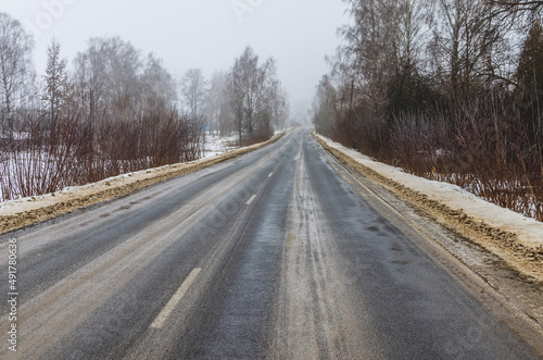 Winter asphalt road in the countryside in russia © Ivan