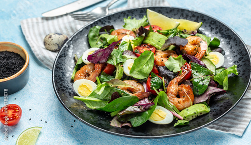 Dietary menu. Healthy salad with cherry tomatoes, cucumber, avocado, eggs and smoked shrimps. Paleo diet menu. banner, menu, recipe, place for text. Top view