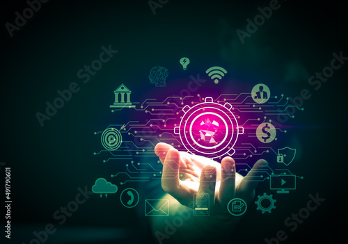 Businessman holding a virtual touch, big data analytics concept, and business intelligence. concept of world map point and line elements of global business Digital Link Technology, Internet of Things © sippapas
