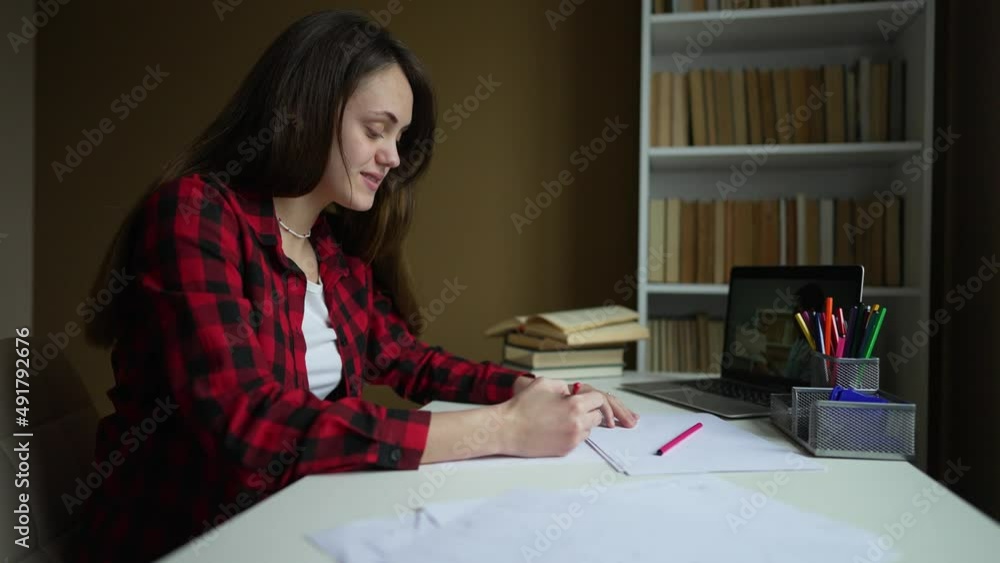 Online school, webcam lessons. Child distance education at home at table with laptop. Girl virtual education college. Technology of online video lessons. Video call of teacher to child. Virtual School Online school, webcam lessons. Child distance education at home at table with laptop. Girl virtual education college. Technology of online video lessons. Video call of teacher to child. Virtual School