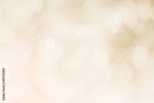 Abstract blurry cream color for background, Blur festival lights outdoor celebration and white bokeh focus decorative.