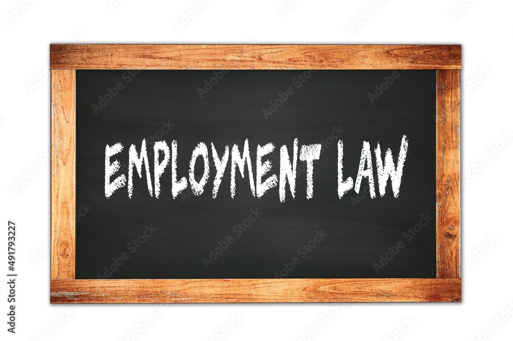 EMPLOYMENT LAW text written on wooden frame school blackboard. EMPLOYMENT LAW text written on wooden frame school blackboard.