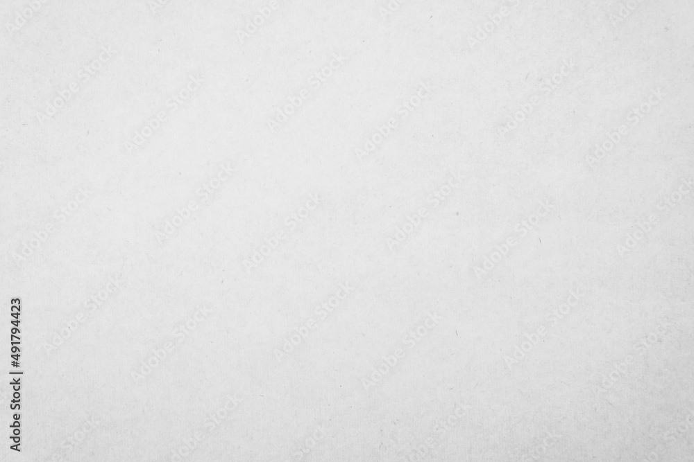 White recycled craft paper texture as background. Grey paper texture, Cardboard with copy space for text. White recycled craft paper texture as background. Grey paper texture, Cardboard with copy space for text.