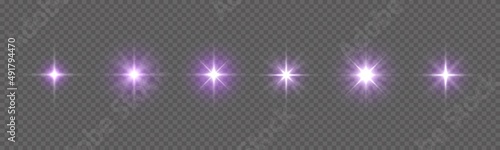Purple light star, sun rays, violet sparks sparkle photo