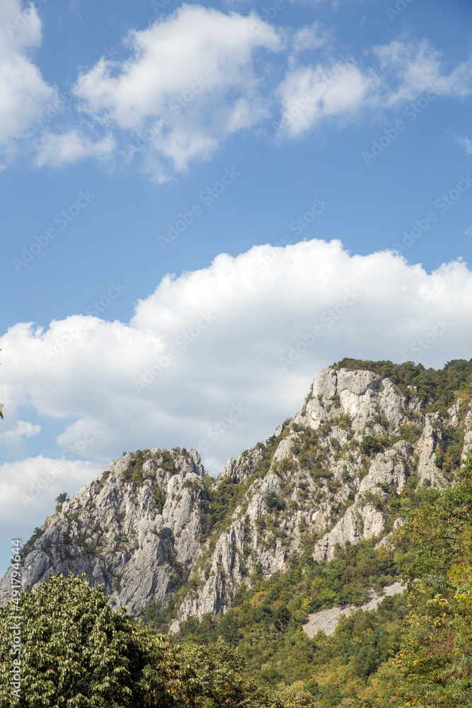 Vertical image of a mountain peak at Carpathian Mountains, Djerdap National Park, Serbia. Vertical image of a mountain peak at Carpathian Mountains, Djerdap National Park, Serbia.