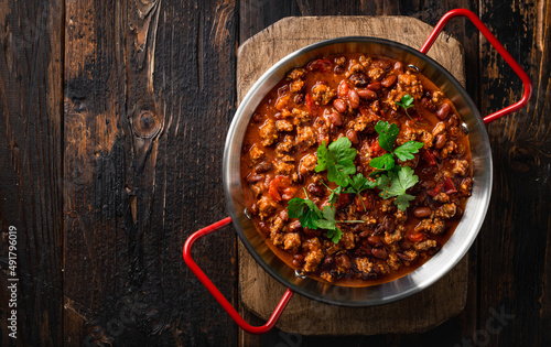 Chili con carne, traditional mexican food, top view, copy space