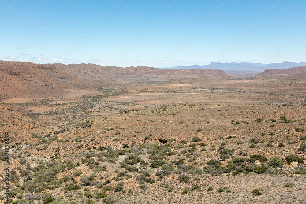 Scene of a valley and mountains in the arid Karoo National Park, South Africa Scene of a valley and mountains in the arid Karoo National Park, South Africa