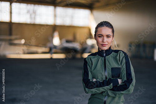 Portrait of a pretty girl, in a pilot suit. photo