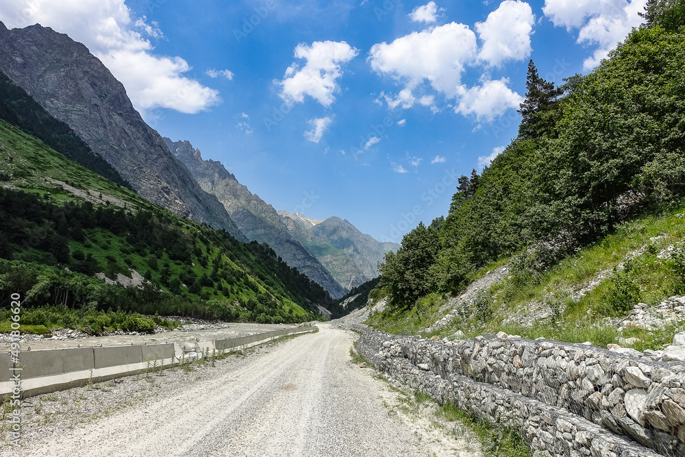 Fototapeta premium A mountain valley in the gorge of the Cherek-Balkar river in the vicinity of the Ushtulu tract. Caucasus 2021