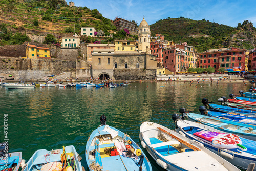 Fototapeta Naklejka Na Ścianę i Meble -  Port of the ancient Vernazza village with many small boats moored, Cinque Terre, National park in Liguria, tourist resort in La Spezia province, Italy, Europe. UNESCO world heritage site.