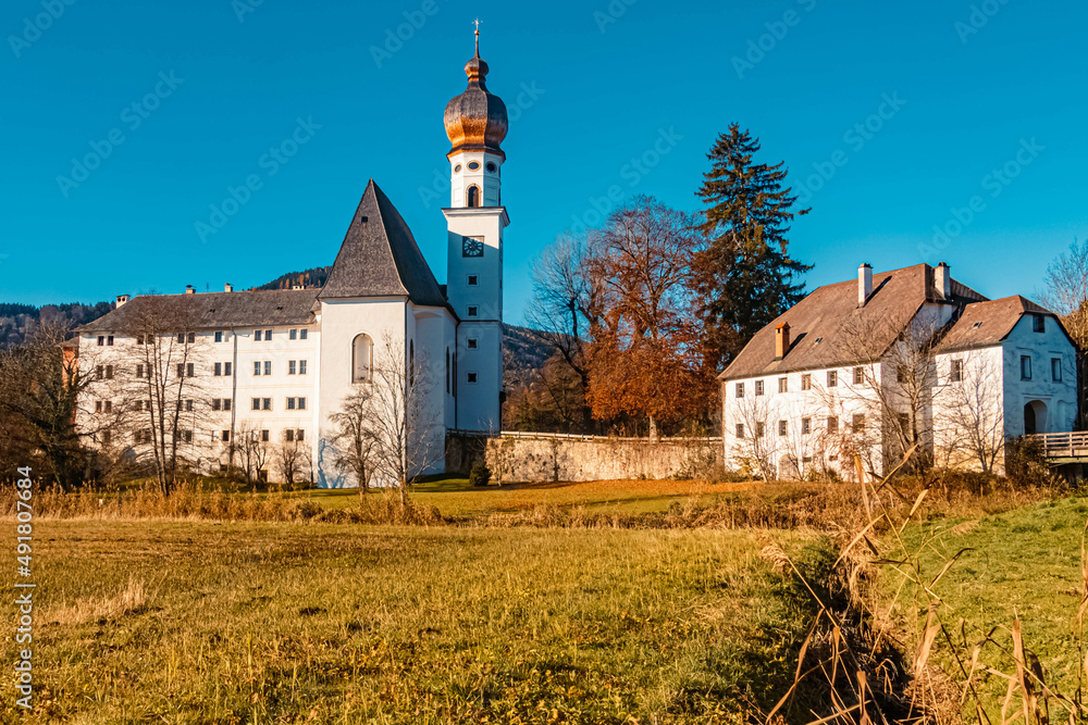 Beautiful monastery at the famous Hoeglwoerther See lake, Hoeglwoerth, Bavaria, Germany