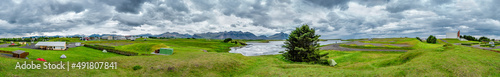 Beautiful panoramic Icelandic landscape with mountains, lagoons and grasslands near city Hofn, South Iceland.
