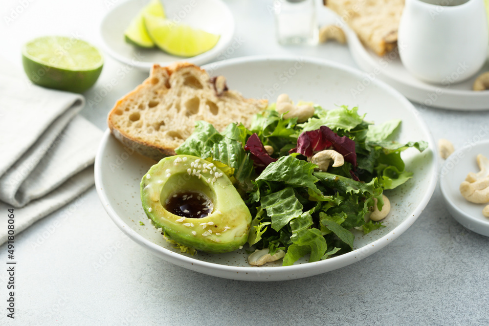 Healthy green salad with avocado Healthy green salad with avocado