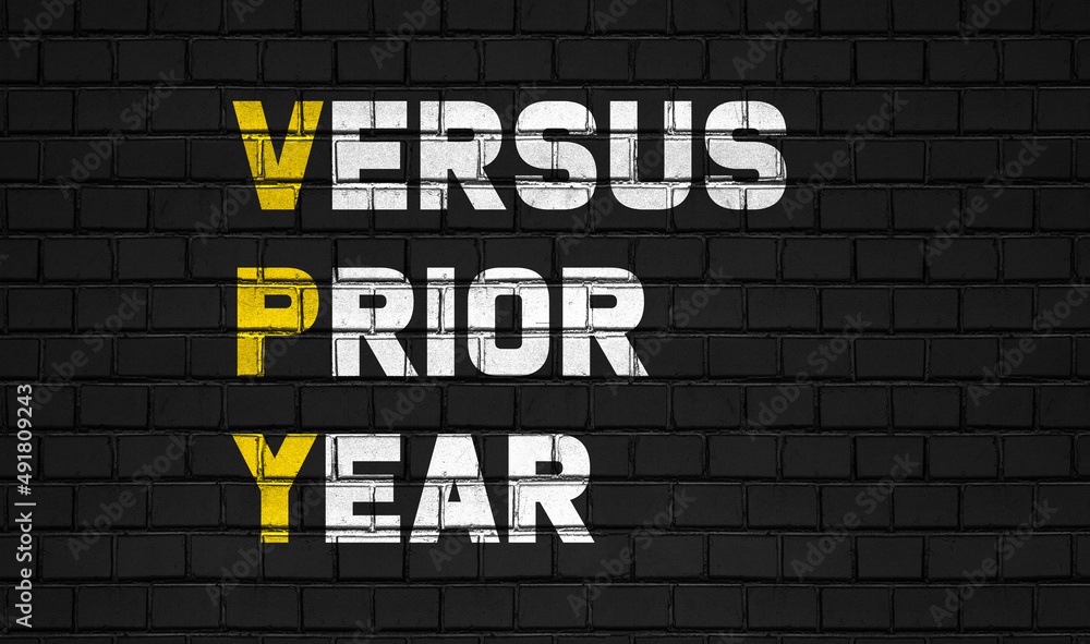 Versus prior year (VPY) concept ,business abbreviations on black wall Versus prior year (VPY) concept ,business abbreviations on black wall