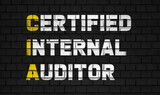 Certified internal auditor (CIA) concept,business abbreviations on black wall 