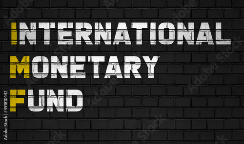 International monetary fund (IMF) concept,business abbreviations on black wall 
 photo