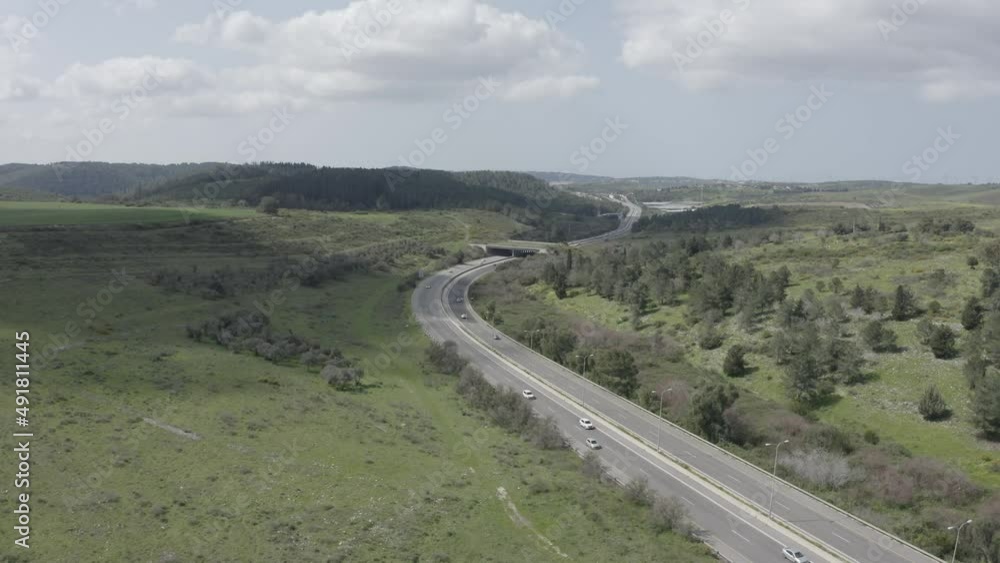 Wildlife crossing bridge allowing animals a safe passage over a rural Highway.
Wildlife crossing bridge allowing animals a safe passage over a rural Highway.