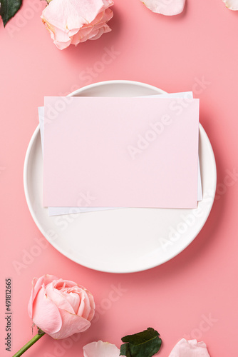 Mother's Day sending gift and meal design concept background with pink rose flower on pink background.