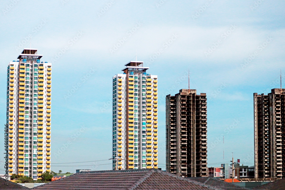 The condominium building in the city The condominium building in the city