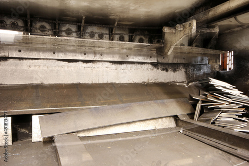 metal parts cut in guillotine machine photo