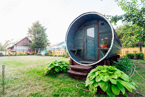 bath barrel made of wood in the backyard