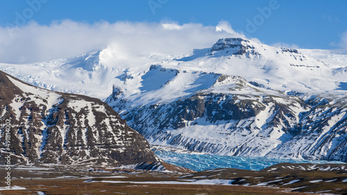 Skaftafell National Park in winter, Southeast Iceland. Mount Hafrafell and Hvannadalshjúkur, Iceland's highest peak (2110m). photo