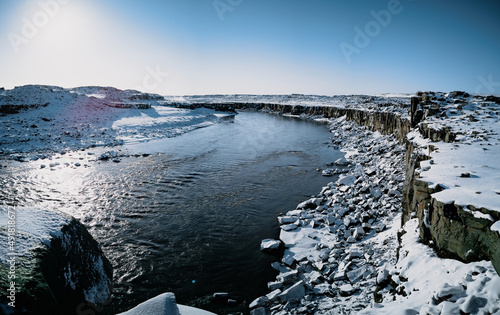 Cube rocks and river with selfoss waterfall in the background